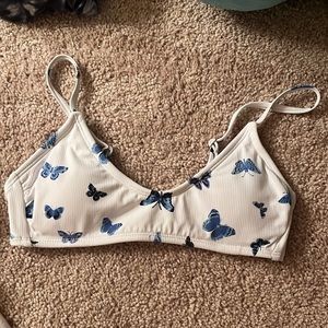 a blue butterfly bikini top